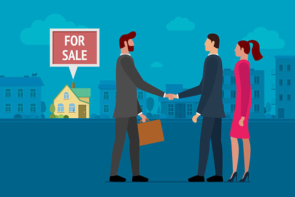 cartoon of a real estate agent shaking hands with home buyers